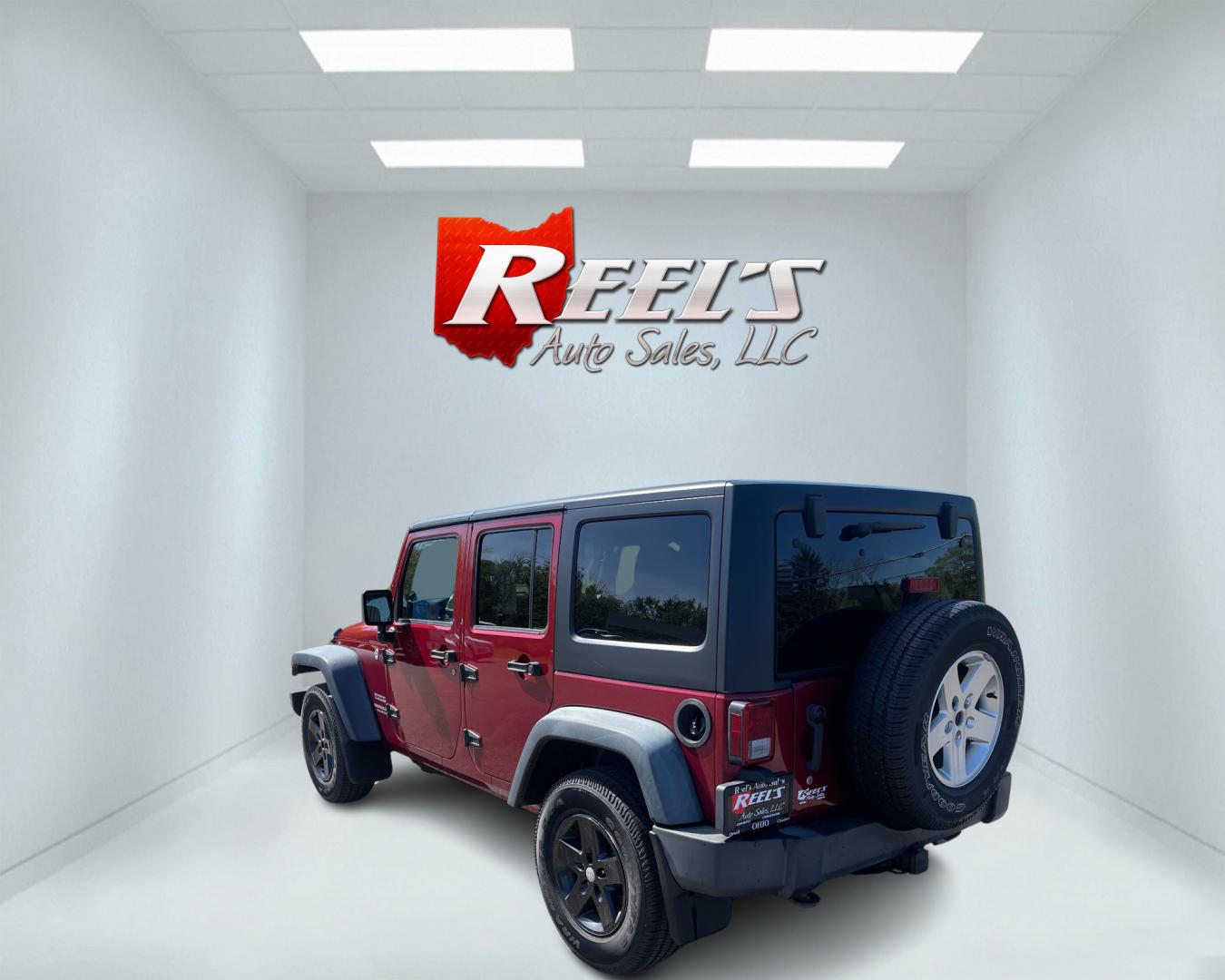 2012 Red /Black Jeep Wrangler Unlimited Sport 4WD (1C4BJWDG3CL) with an 3.6L V6 DOHC 24V engine, 5-Speed Automatic transmission, located at 547 E. Main St., Orwell, OH, 44076, (440) 437-5893, 41.535435, -80.847855 - This 2012 Jeep Wrangler Unlimited Sport with 4WD features a robust 3.6-liter Pentastar V6 engine paired with a 5-speed automatic transmission. It is equipped with a Dana 44 rear axle and a Dana 30 front axle, ensuring durable and reliable off-road capabilities. The model comes with a hardtop convert - Photo#7